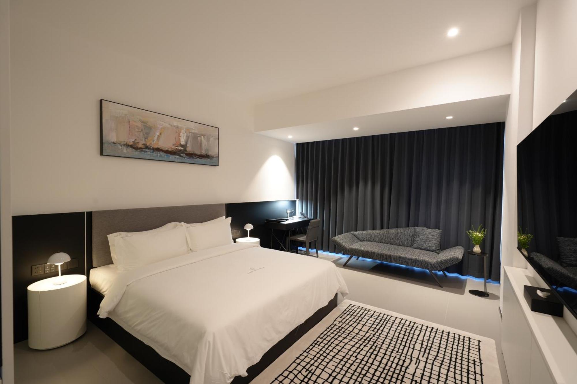 One Riviera Hotel And Residences Ban Souanmone Extérieur photo